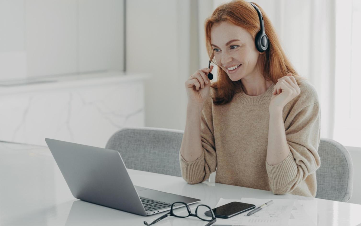 Person reviewing financial documents and planning budget